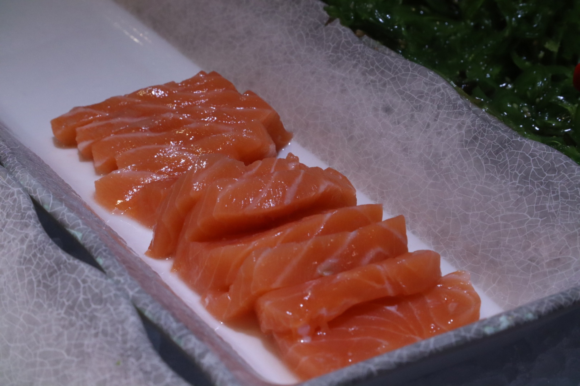 Fresh salmon sashimi served at LaMeiZi